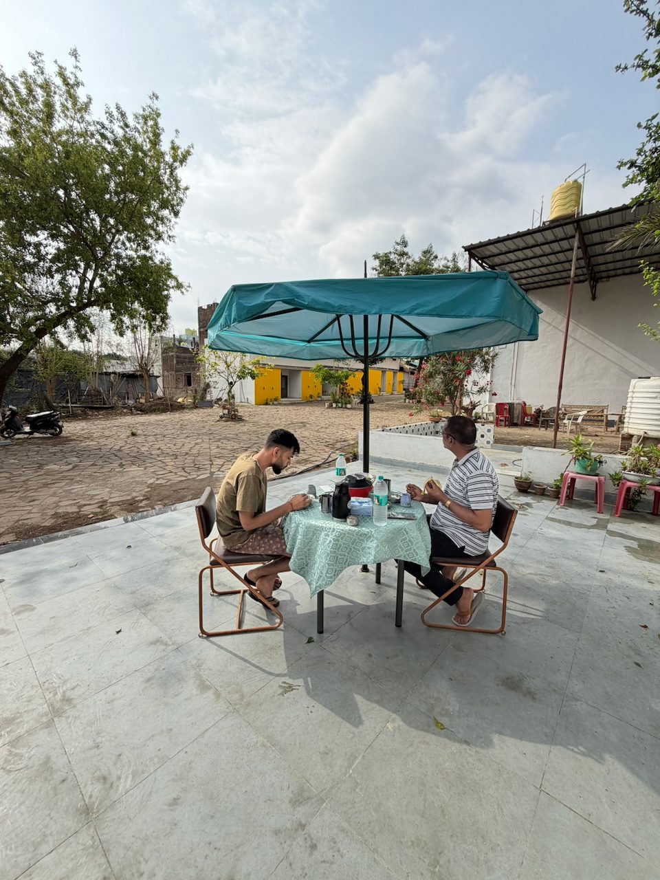 Lunch outdoors, under a parasol