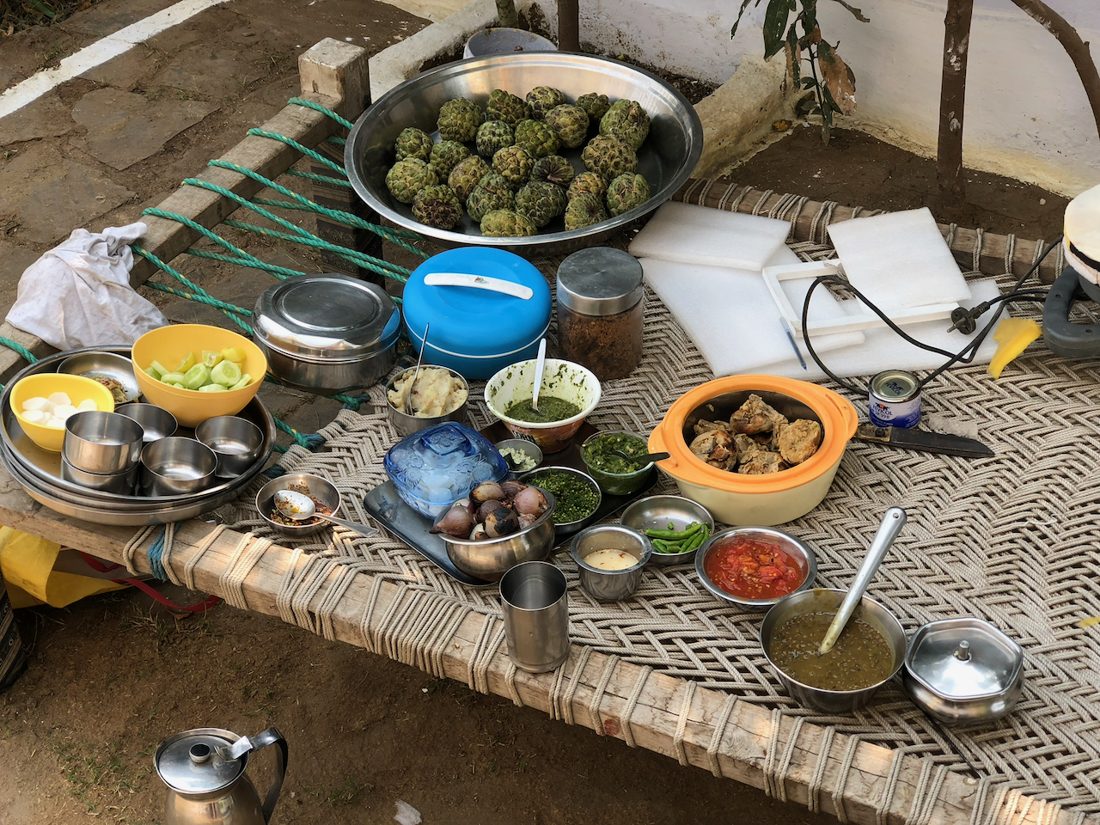 The kitchen's spread, on a charpai