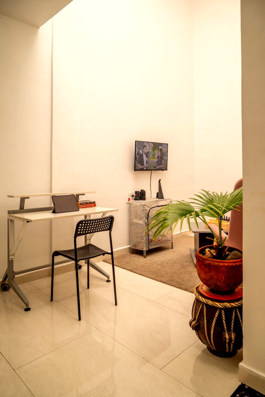 Work desk and chair by the window in the Premium room